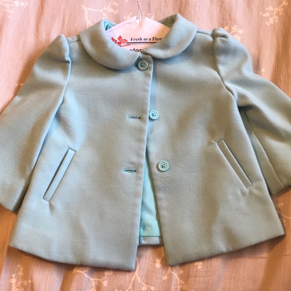 Girls’ Lght blue jacket J & J size 3-4 yrs